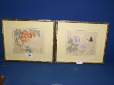 A pair of oriental Prints, both framed but one unglazed.