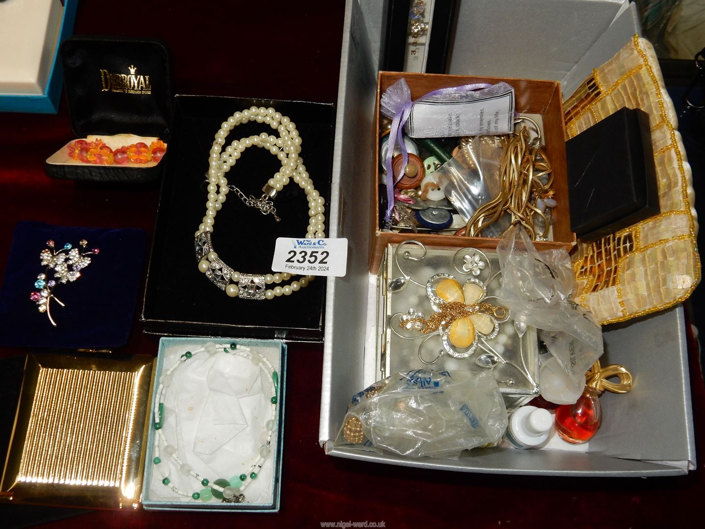 A quantity of costume jewellery including silver studs and silver clip-on hoops, bead necklaces,