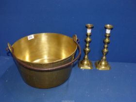 A pair of brass candlesticks and a large Copper jam pan, 13" diameter x 7" high.