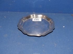 A Silver Card tray, Chester 1913 octagonal shaped having wavy edge and button feet,