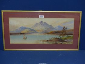 A framed and mounted Watercolour depicting sailing boats on a calm loch with rugged mountains in