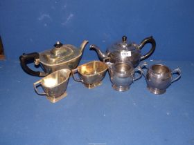 Two Epns three piece Teasets having Bakelite handles and finials.