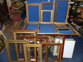 A quantity of picture frames, various sizes, some glazed.