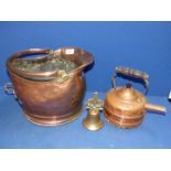 A copper coal scuttle and kettle plus a brass bell.