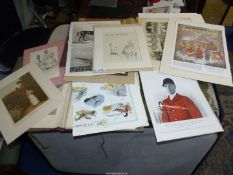 A Portfolio containing prints and pages from books and magazines.