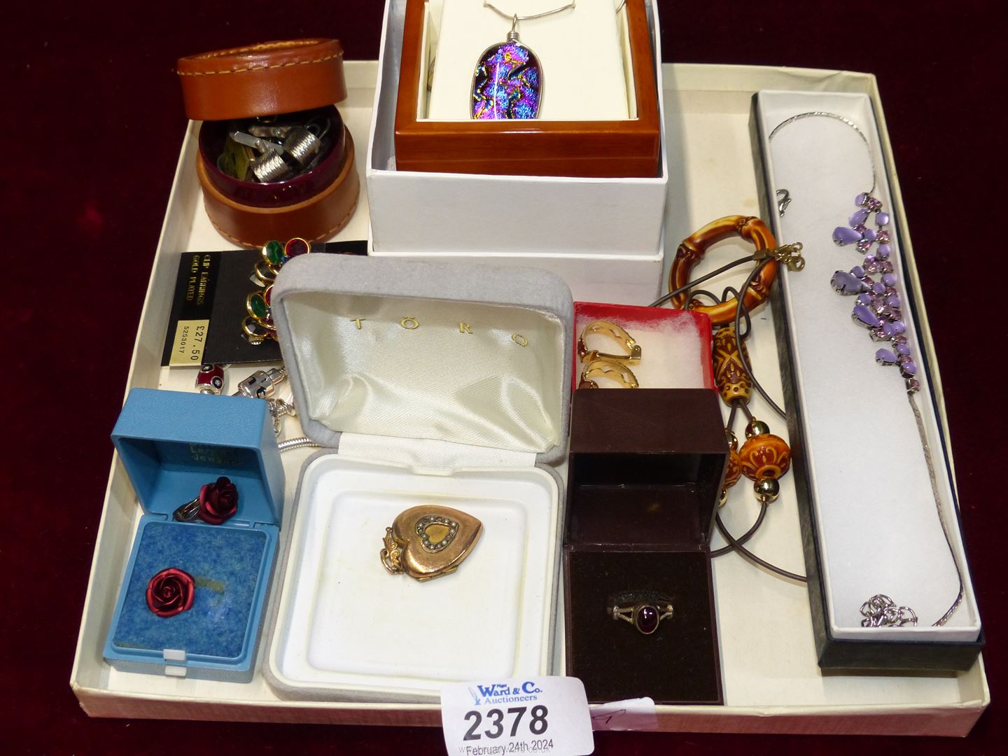 A small quantity of ladies jewellery including a silver ring set with deep red stone,