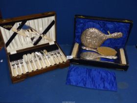 A cased EPNS dressing table set (a/f) and cased set of fish eaters and servers.