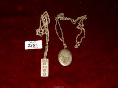 A silver ingot pendant hallmarked London 1977 makers P J on Silver chain,