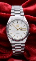 A Seiko 5 Automatic 37mm White Face stainless steel Watch, 7S26.