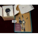 A Ladies watch Guess quartz with two extra links and pins,together with a Ladies Accurist watch,