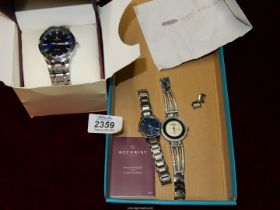 A Ladies watch Guess quartz with two extra links and pins,together with a Ladies Accurist watch,