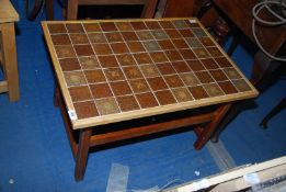 A tiled top coffee table.