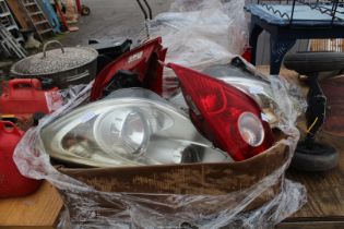 07 Vauxhall Corsa headlamps x 2 and two tail lamps.