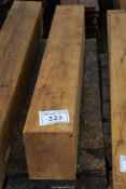 A piece of Oak timber 9" x 7" x 49" long.