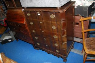 A Satinwood Chest of five drawers with shaped front, 33" wide x 19 1/2" deep x 41 1/2" high.