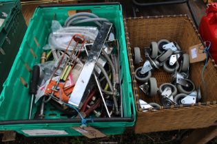 Two boxes containing rubber wheeled castors, plumbing equipment, flexipipe, etc.