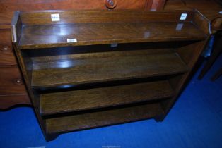 An Oak four shelf open bookcase 37" wide x 7 1/2" deep x 3' high.