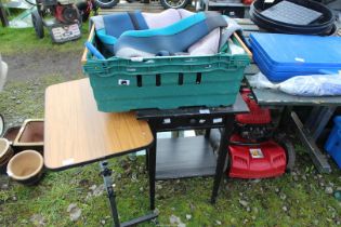 Two tables, wet suit jacket, etc.