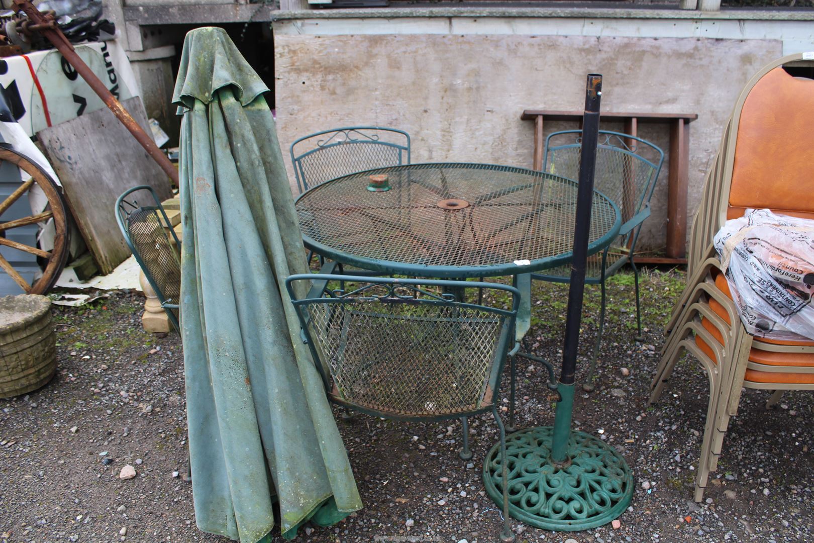 Patio table 42'' diameter x 28 1/2'' high with four chairs and parasol base.