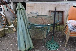 Patio table 42'' diameter x 28 1/2'' high with four chairs and parasol base.