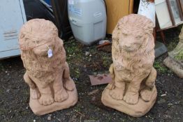 A pair of concrete lions.