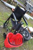 "Aidapt" fold-up Wheelchair and pull-along plastic shopping basket.