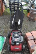 "Santi" self-propelled Lawn Mower with grass box, engine turns.