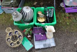 Two boxes containing oil lamp bases, candle holder, stainless steel chimney cowl, etc.