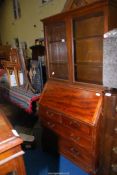 A Mahogany Bureau/bookcase with two short over two long drawers, 33" wide x 16" deep x 69" high,