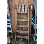 Five rung wooden step ladder.