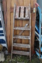 Five rung wooden step ladder.