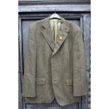 A Gents pure wool Sports jacket by Alpendale in light brown herringbone and red check tweed with