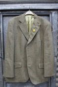 A Gents pure wool Sports jacket by Alpendale in light brown herringbone and red check tweed with