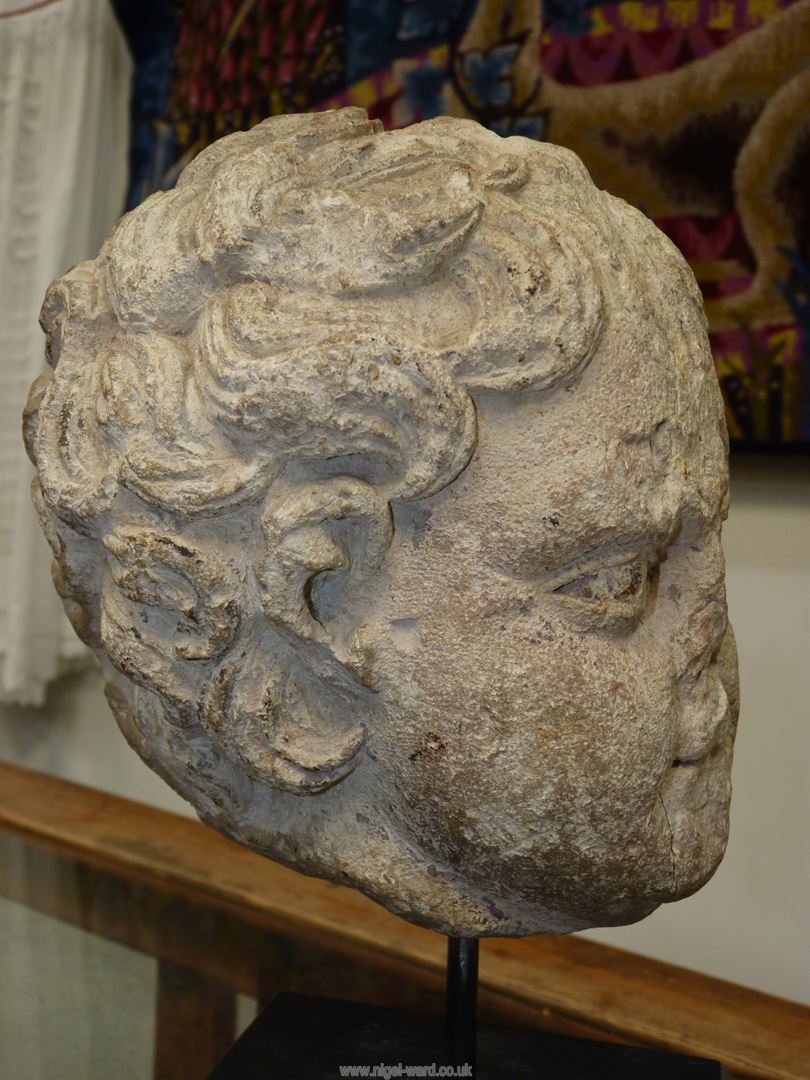 A very early life size marble head from a free standing figure of a young child. - Image 8 of 15