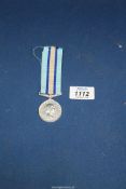 A Royal Observer Corps Medal named 82636 Chief Observer R B Angus Roc.