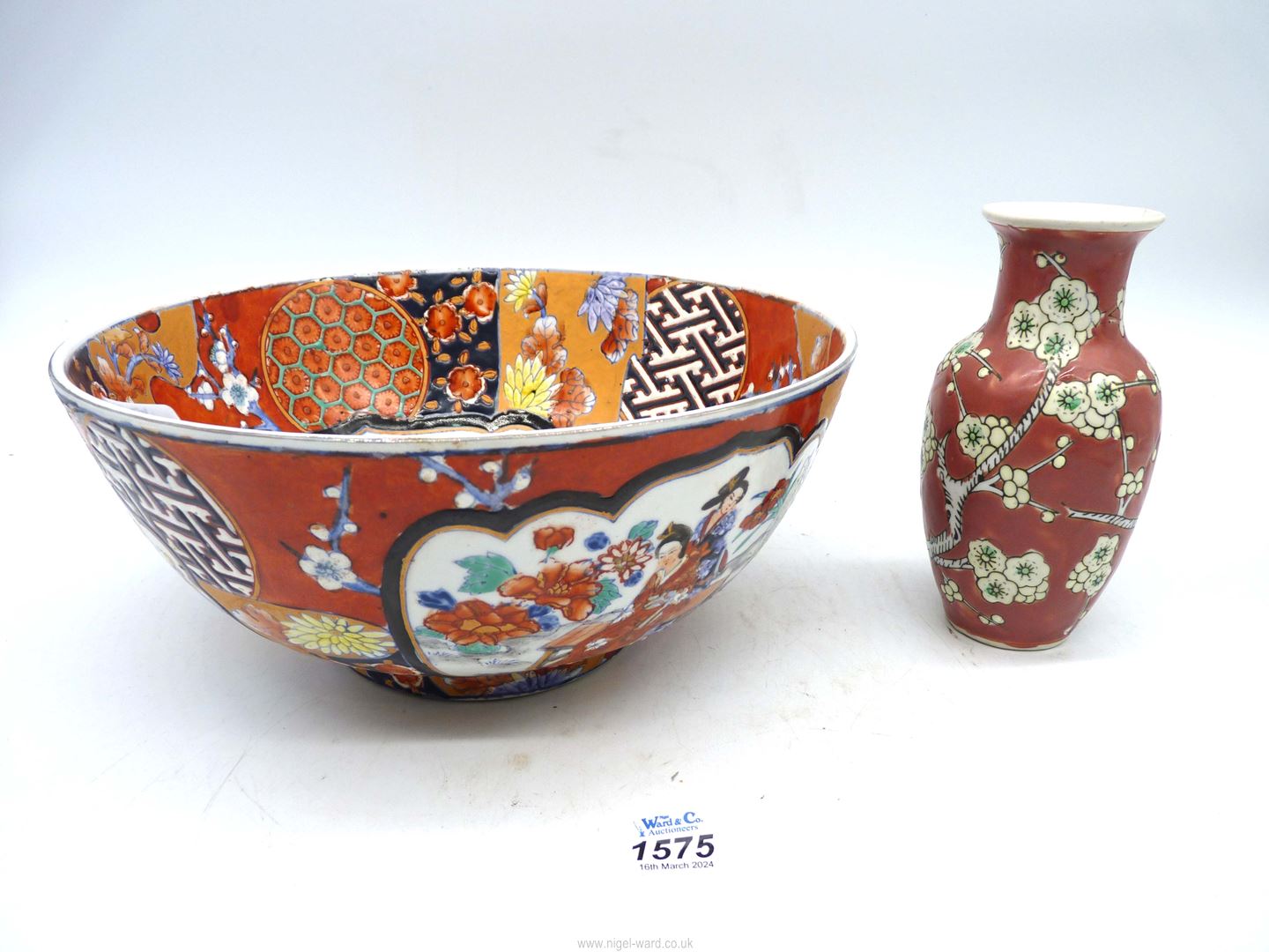 A Japanese Satsuma bowl, circa 1900, together with a small pink vase having floral decoration.