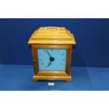 A Bracket clock with pocket movement in pine case.