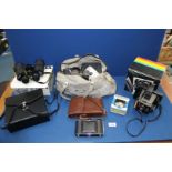 A quantity of miscellanea including cameras, Miranda 10 x 50 binoculars, pedometer,