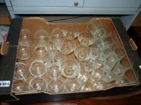 A quantity of glasses including five cut glass champagne coups,