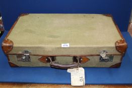 A canvas and leather trim 1968 military suitcase by Papworth Industries.