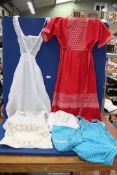 A 1970's sun dress plus old lace pinafores, Christening gowns, etc (some a/f).