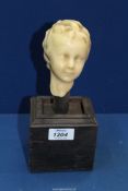 An unusual antique sculptor’s maquette in the form of a child’s head, 19th century or earlier,
