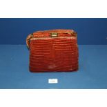 A vintage Crocodile skin Handbag.