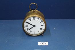 A circular brass drum Railway clock having white enamel face,