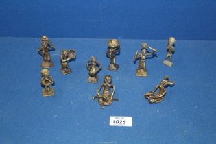 A group of nine early to mid 20th century Ashanti/Akan bronze weight figures.