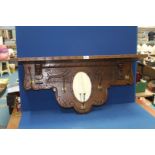 An Oak wall hanging hall Mirror/Shelf with coat hooks and mirror, 40'' wide x 18'' high.