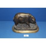 A Bronze model of a Sow on stepped base, signed J. Moigniez to base, 10'' wide overall x 6'' high.