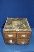 A four drawer - eight sectioned Filing cabinet, 13 1/4" wide x 15" deep x 9 1/2" high.