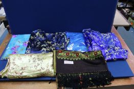 A quantity of Kimonos including navy and gold silk,