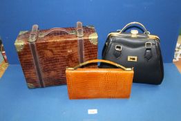 A small case (mock crocodile skin), a brown vintage handbag and a large black handbag.